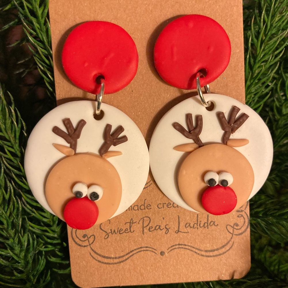 Reindeer Christmas dangle earrings with red studs. Handmade polymer clay.
